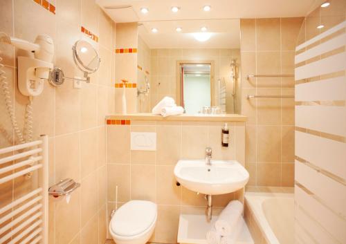 Hotel Savica Garni - Sava Hotels & Resorts Room Type - Two-Bedroom Apartment Hotel Savica Garni - Sava Hotels & Resorts Room Type - Two-Bedroom Apartment