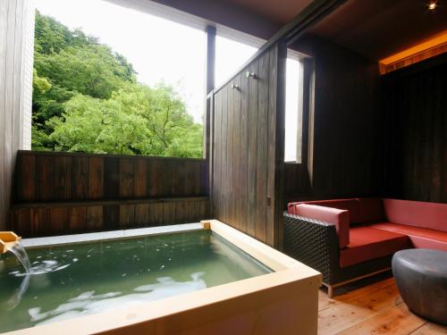 Twin Room with Tatami Area and Open-Air Bath Type E