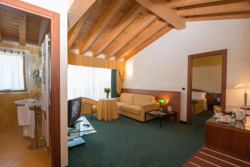 Suite with Balcony and Pool View