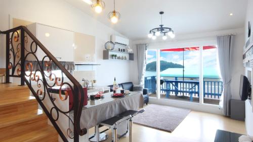 Blue & White Pension Blue & White Pension is conveniently located in the popular Seo-myeon area. The property has everything you need for a comfortable stay. Service-minded staff will welcome and guide you at Blue & White