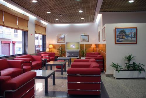 Sala de estar/TV partilhada, Hotel Anjos in Lisboa