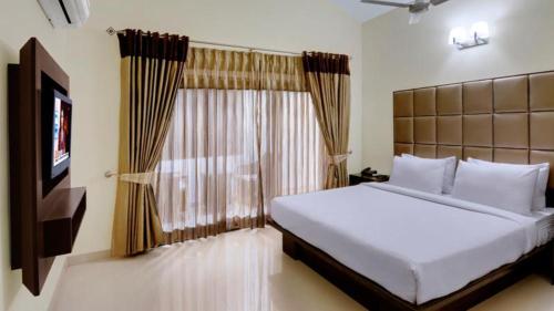 Δωμάτιο, The Golden Suites & Spa Calangute Hotel in Γκόα