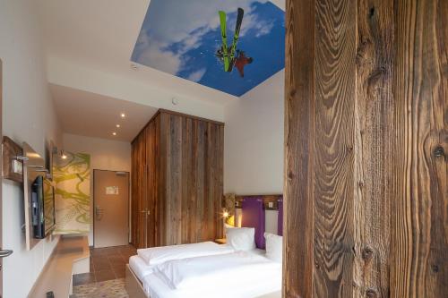 Explorer Hotel Hinterstoder - Tap to explore photos