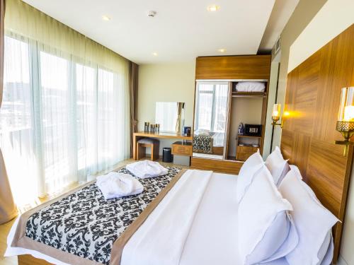 Alesha Suite Hotel & Residence - image 9