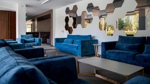 ห้องส่วนกลางสำหรับนั่งเล่น/ดูทีวี, โรงแรมโด ปาร์เก (Hotel do Parque) in เวียนา โด คาสเตโล