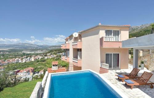 Family friendly apartments with a swimming pool Podstrana Split - 13828