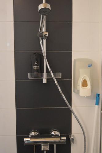 Bathroom, Hotelli Ravintola Tiilikka in Rautavaara