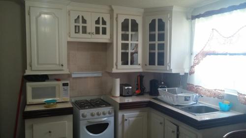 Kitchen, JersonApartments in Oistins