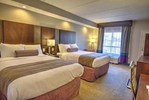 Queen Room with Two Queen Beds and Mobility Accessible Roll-In Shower - Non-Smoking