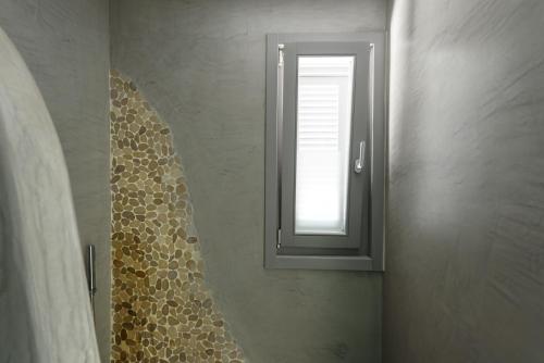 Enalion White Suites Oia - Tap to explore photos