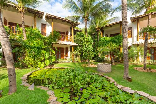 Vila Coqueiros Boutique Hotel - 정원
