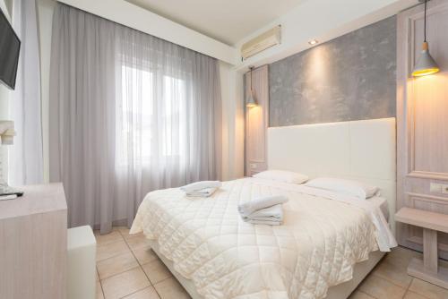 Hotel George – Thassos Town, MO