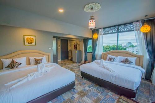 Sridonchai Heritage Chiang Mai Room Type - Rooftop Quadruple Room with Balcony Sridonchai Heritage Chiang Mai Room Type - Rooftop Quadruple Room with Balcony