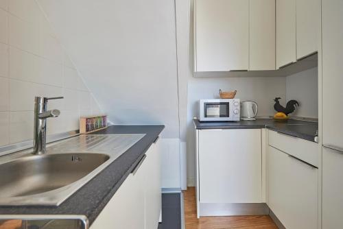 Charming apartment em Belem-Books and Canvas