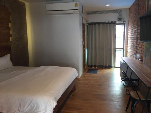 De Nan Hotel in Nai Wiang