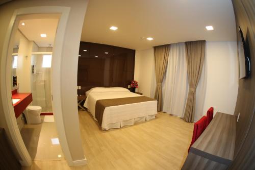 Holiday & Business Hotel - Em frente ao Centro de Eventos e Arena Conda, Chapecó (foto 8)