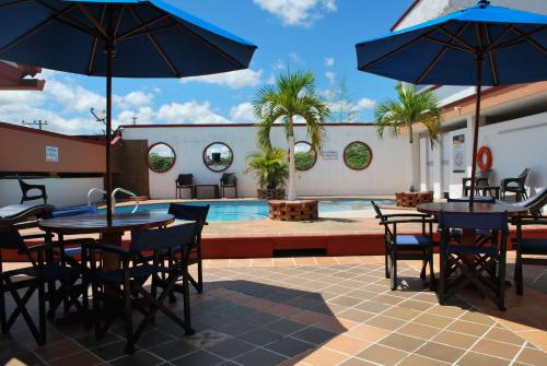 Swimming pool, Hotel Hacaritama Colonial in Villavicencio City Center