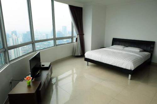 2BR Denpasar Residence Penthouse Apartment By Travelio