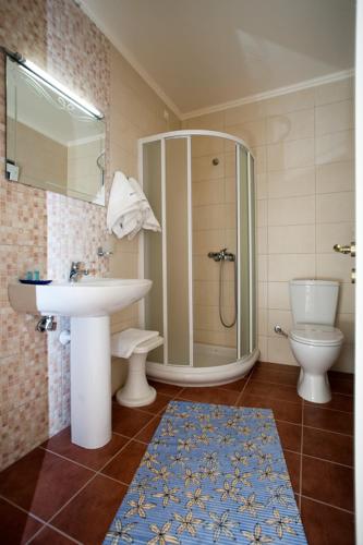 חדר אמבטיה, Olympos Hotel in קומוטיני