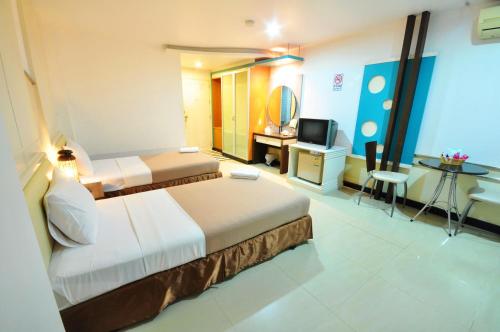 The Great Hotel Hatyai The Great Hotel Hatyai is conveniently located in the popular Hat Yai Market Area area. Offering a variety of facilities and services, the property provides all you need for a good nights sleep. Serv