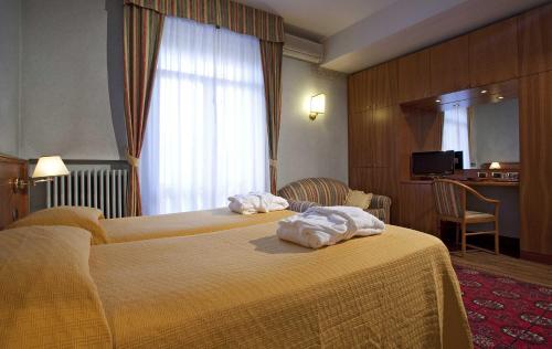 Hotel Harrys Garden Set in a prime location of Abano Terme, Hotel Harrys Garden puts everything the city has to offer just outside your doorstep. The hotel offers guests a range of services and amenities designed to pro