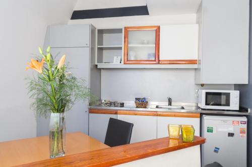 Kitchen, Rosario Suites in Del Abasto