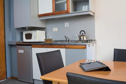 Kitchen, Rosario Suites in Del Abasto