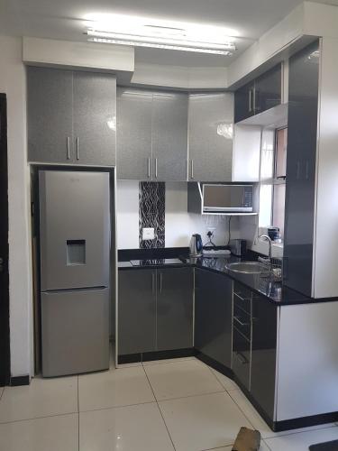 Kitchen, Beachurst Apartment in Marine Parade