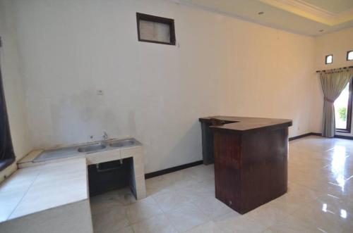 Puri Itoma Bungalows – Praya, ID