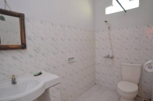 Puri Itoma Bungalows – Praya, ID
