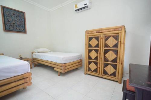 Puri Itoma Bungalows – Praya, ID