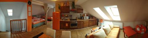Orange Loft Apartment - image 2