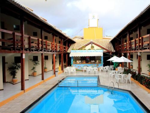 Hotel Adriattico Stop at Hotel Adriattico to discover the wonders of Porto Seguro. The property offers a wide range of amenities and perks to ensure you have a great time. Service-minded staff will welcome and guide y