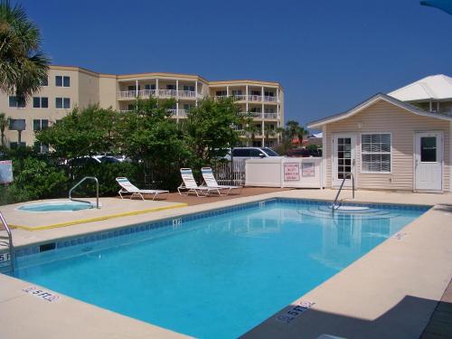 Swimming pool, Summerspell Condominum near Captain Dave's On The Gulf
