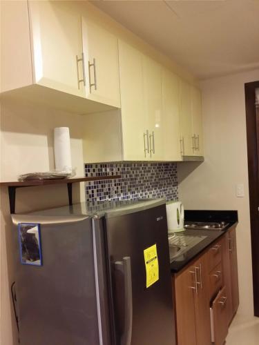 Palm Tree Condos across NAIA3 by Beth Palm Tree Condos across NAIA3 by Beth