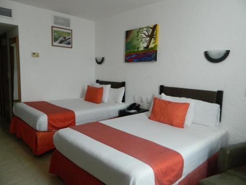 Hotel Enriquez Hotel Enriquez is perfectly located for both business and leisure guests in Coatzacoalcos. The property offers guests a range of services and amenities designed to provide comfort and convenience. Ser