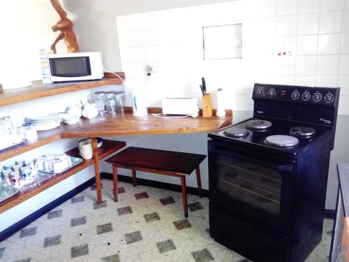 Cozinha, Pennywise Cottages in Victoria Falls