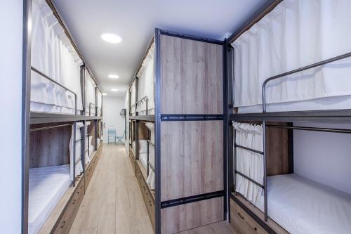 Bed in 12-Bed Dormitory Room