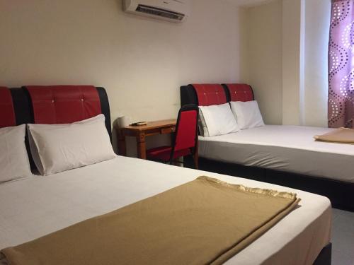 Ophir Inn near Rambutan Tree