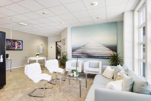 gedeelde lounge/tv-ruimte, Kongsvinger Budget Hotel in Kongsvinger