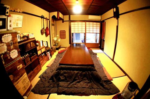 Shared lounge/TV area, Guesthouse Kioto in Kinugasa