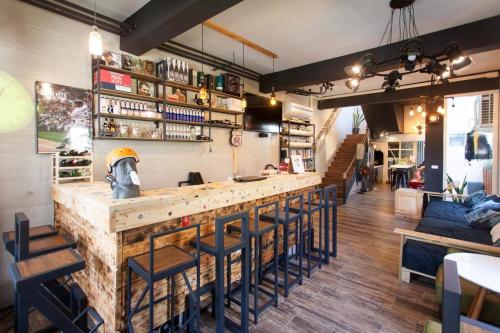 Shared lounge/TV area, 40Inn Backpackers Warehouse in Taitung