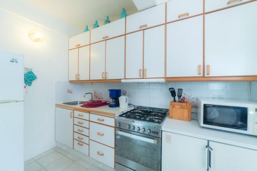 Cocina, Royal Palm Holiday Apartment in Mero