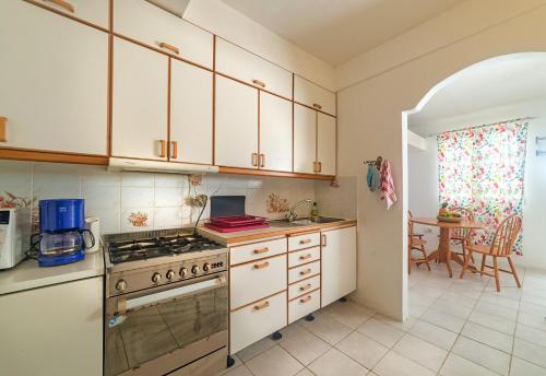 Cocina, Royal Palm Holiday Apartment in Mero