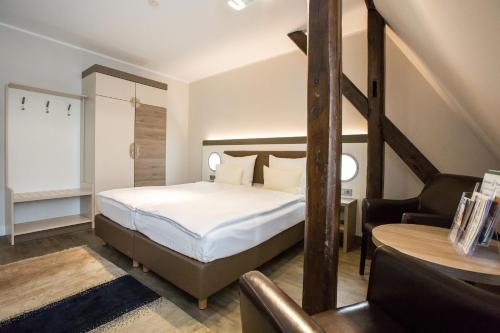 Best Western Plus Theodor Storm Hotel Stop at Best Western Hotel Theodor Storm to discover the wonders of Husum. The hotel offers a wide range of amenities and perks to ensure you have a great time. Service-minded staff will welcome and g