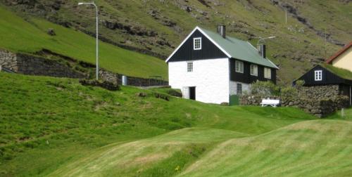 . Idyllic house near river and ocean