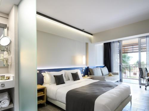 Blue Dolphin Hotel Blue Dolphin Hotel is perfectly located for both business and leisure guests in Metamorfossi. Featuring a complete list of amenities, guests will find their stay at the property a comfortable one. All