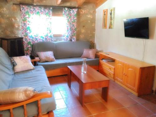 Közös társalgó / TV, Casa Rural en Aldea Cueva Ahumada in Salobre