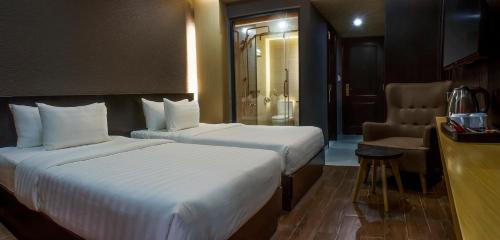 Deluxe Double or Twin Room with Balcony room in Golden Nha Trang Hotel