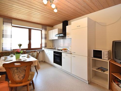 Kitchen, Holiday home on the first floor with private entrance and large garden in Gleissenberg